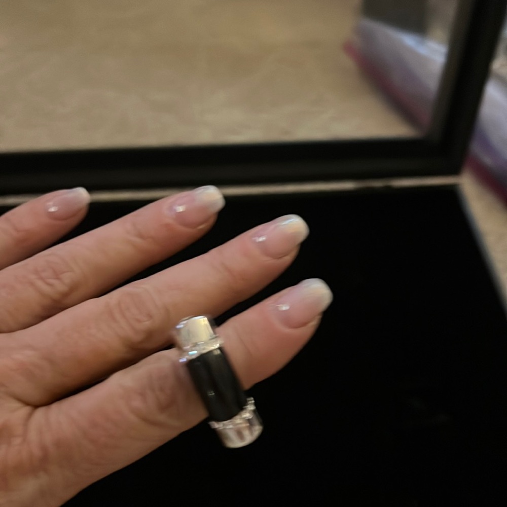 cocktail ring -black stone with crystal ends set in silver